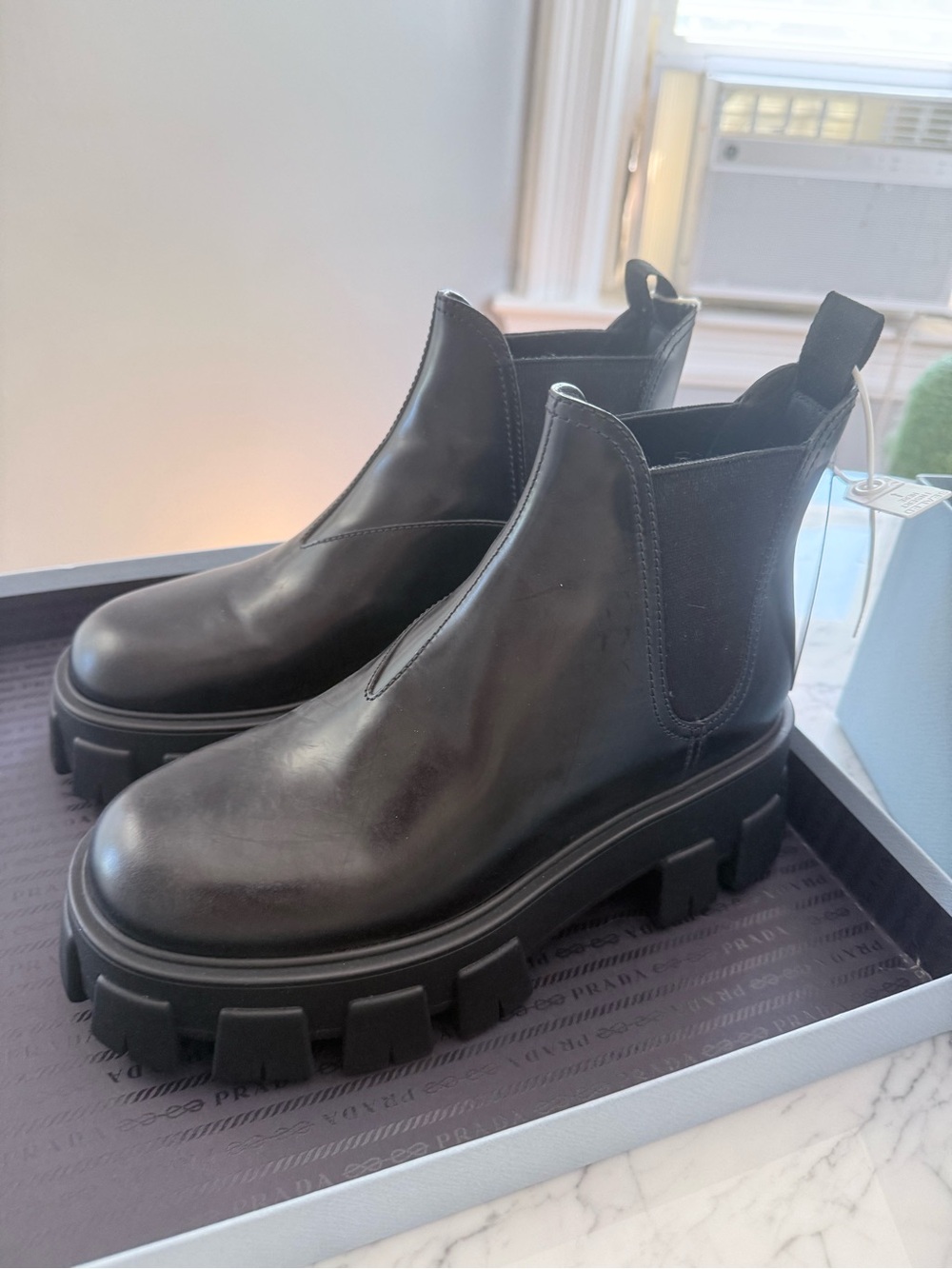 Prada Monolith Leather Ankle Boots